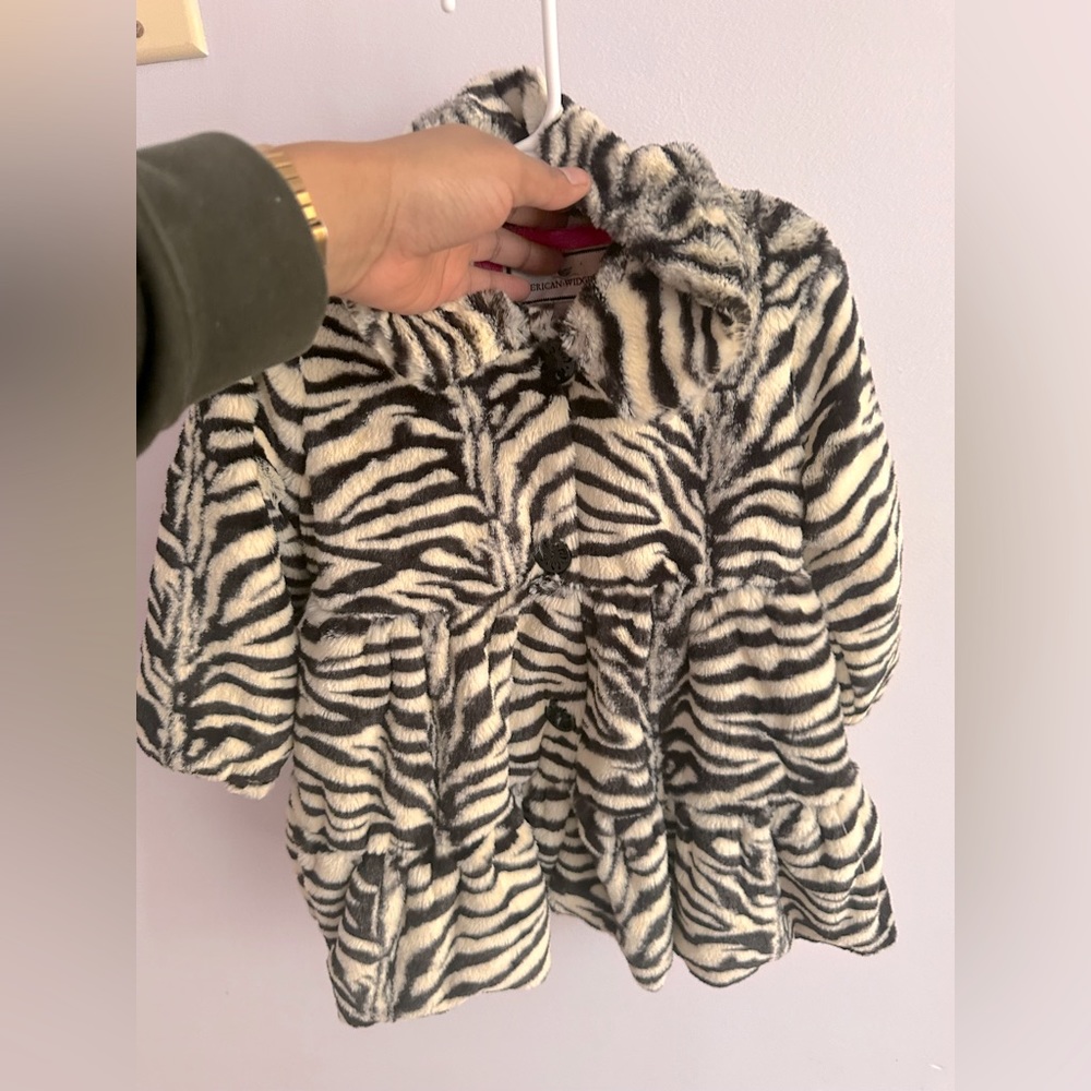 Adorable zebra print fair fur toddler jacket.